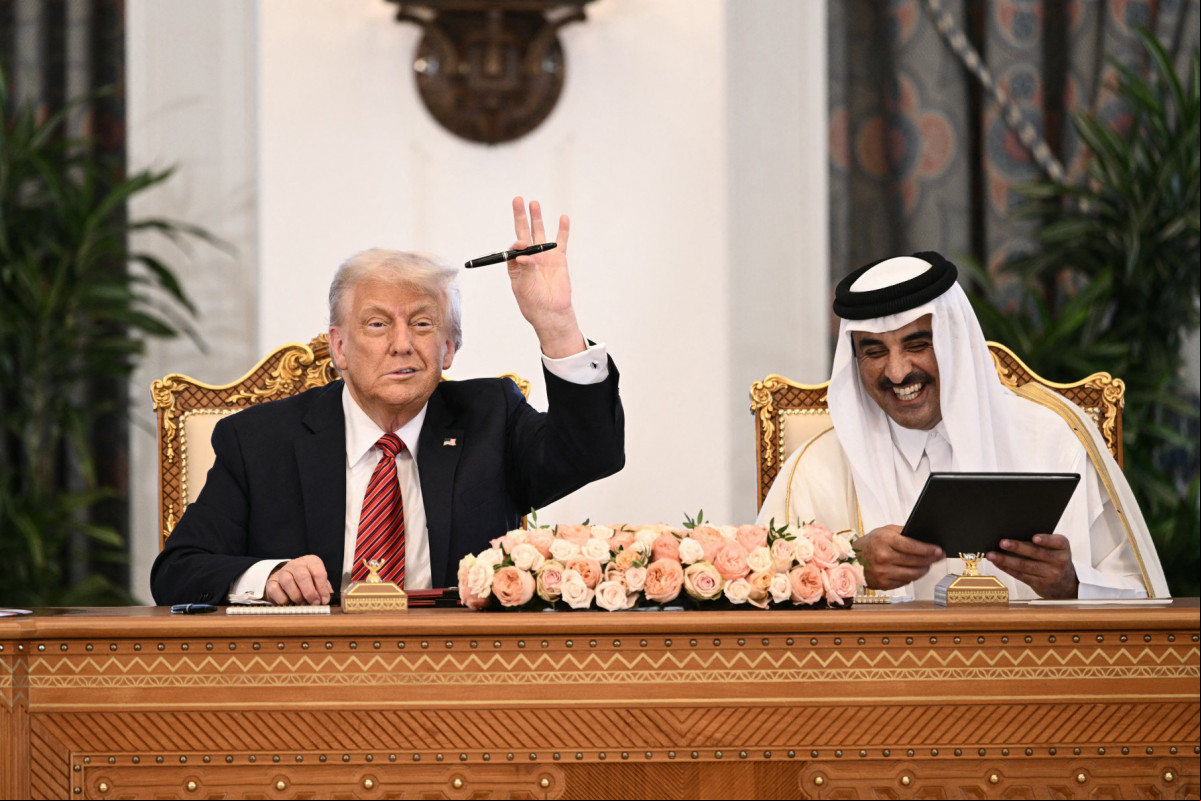 Acordo foi assinado durante a visita de Trump a Doha /BRENDAN SMIALOWSKI/AFP Acordo foi assinado durante a visita de Trump a Doha /BRENDAN SMIALOWSKI/AFP